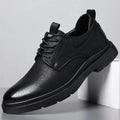 Men's black and brown leather business shoes with rubber soles and sewing line detail