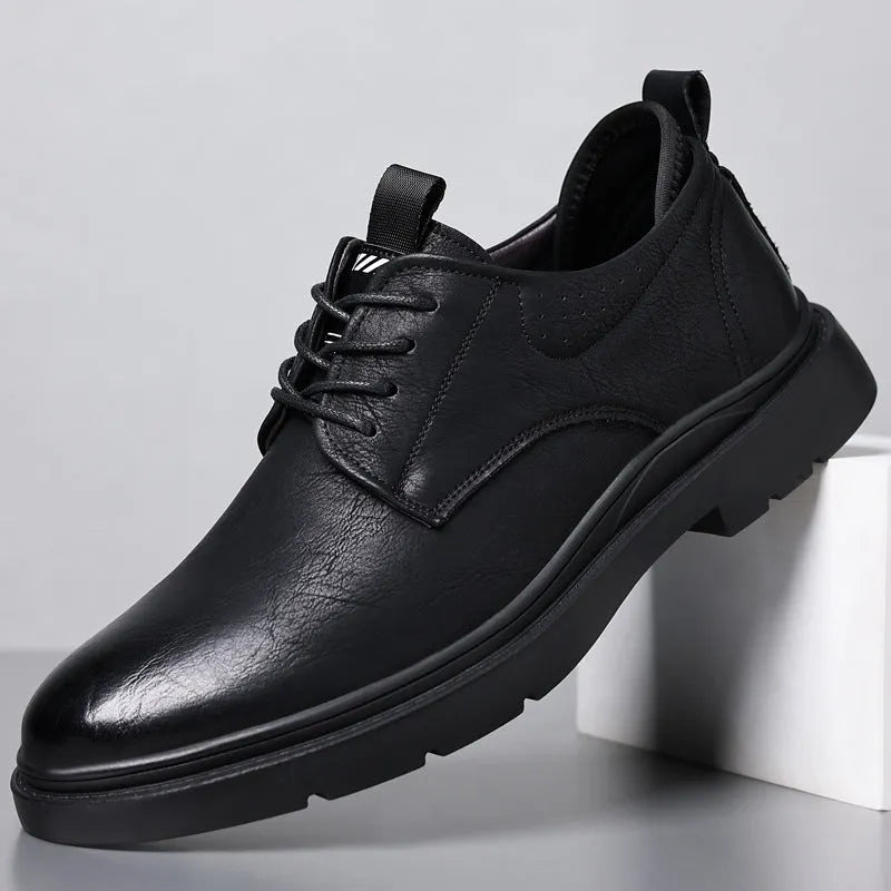 Men's black and brown leather business shoes with rubber soles and sewing line detail