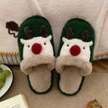 Women's green plush Christmas slippers with an elk design and a non-slip PVC sole.