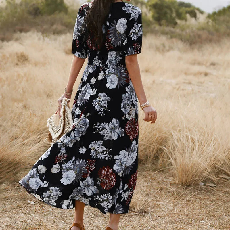 Women's floral print summer dress with V-neck, short sleeves, elastic high waist, and large hemline midi skirt