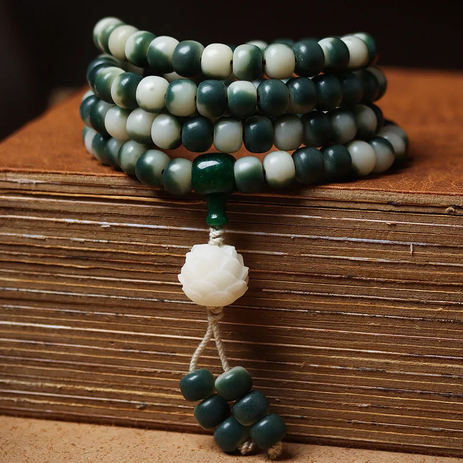 Lotus white jade bodhi beads bracelet with carved floral patterns on 8mm jade beads