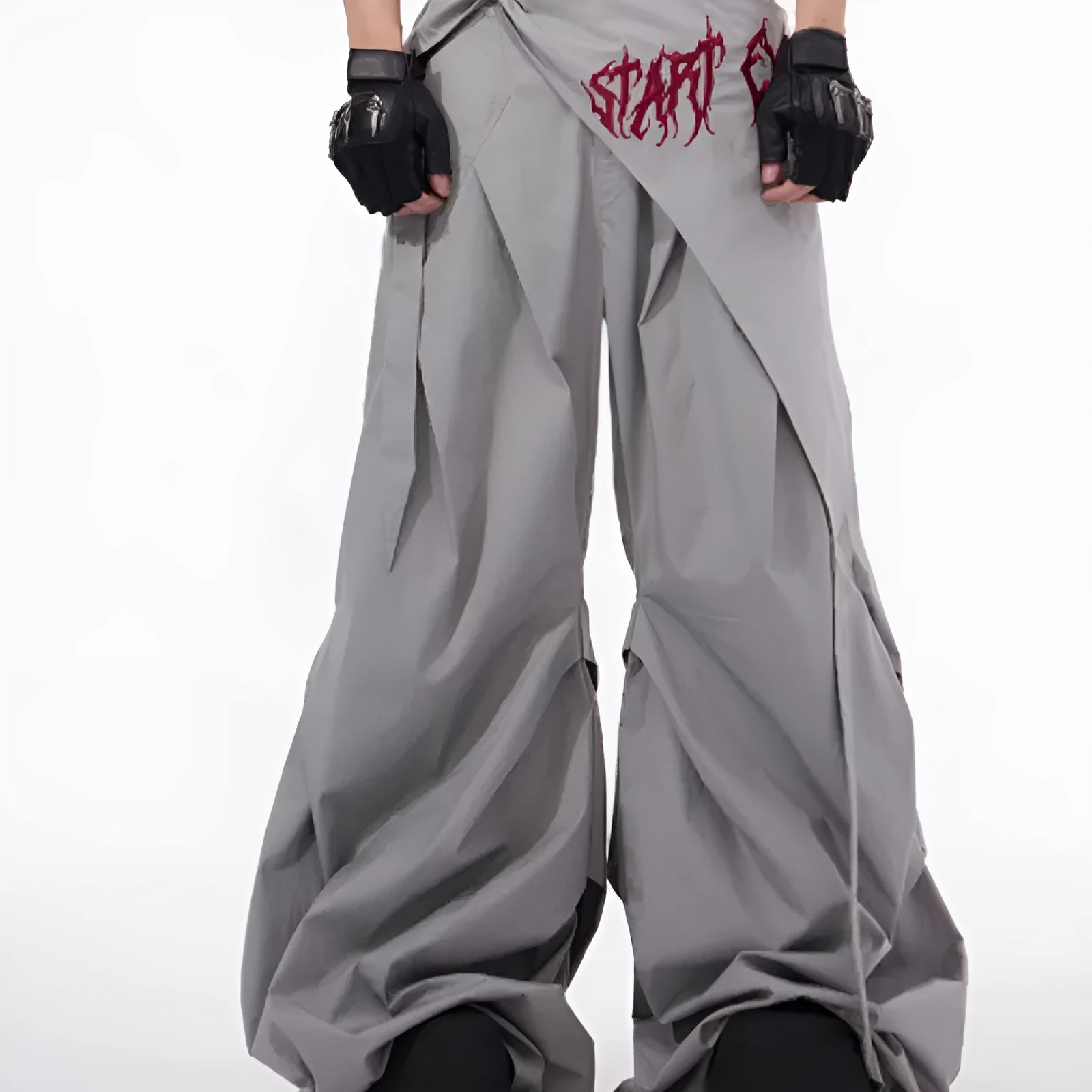 Boy modelling black wide-leg Korean-style summer trousers.