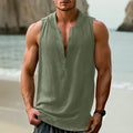 Men's sleeveless cotton linen shirt in mint green with non-ironing treatment, showing casual style and fabric texture