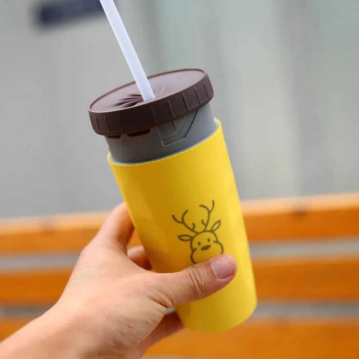 Double insulation travel tumbler with twist-top silicone seal showing cartoon patterns