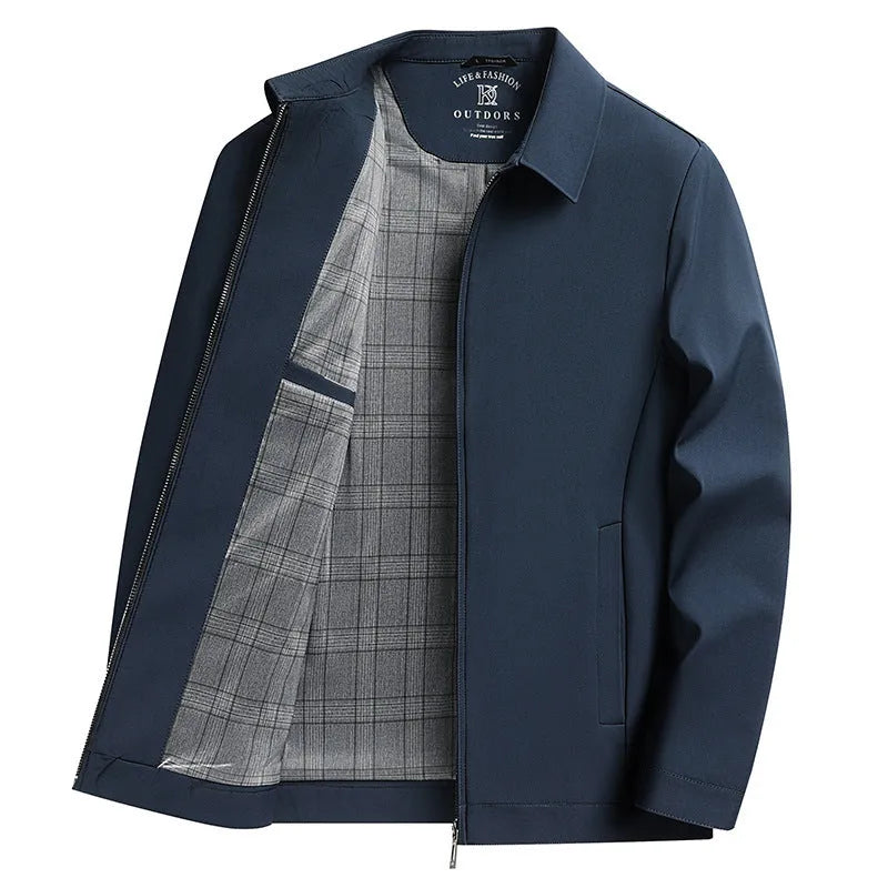 Man wearing a khaki polo collar loose-fit casual jacket with side seam pockets.