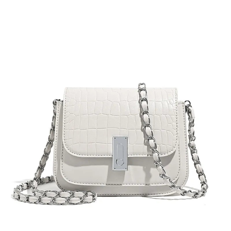 Women's black chain shoulder bag with cross-body strap and internal phone pocket, horizontal square shape