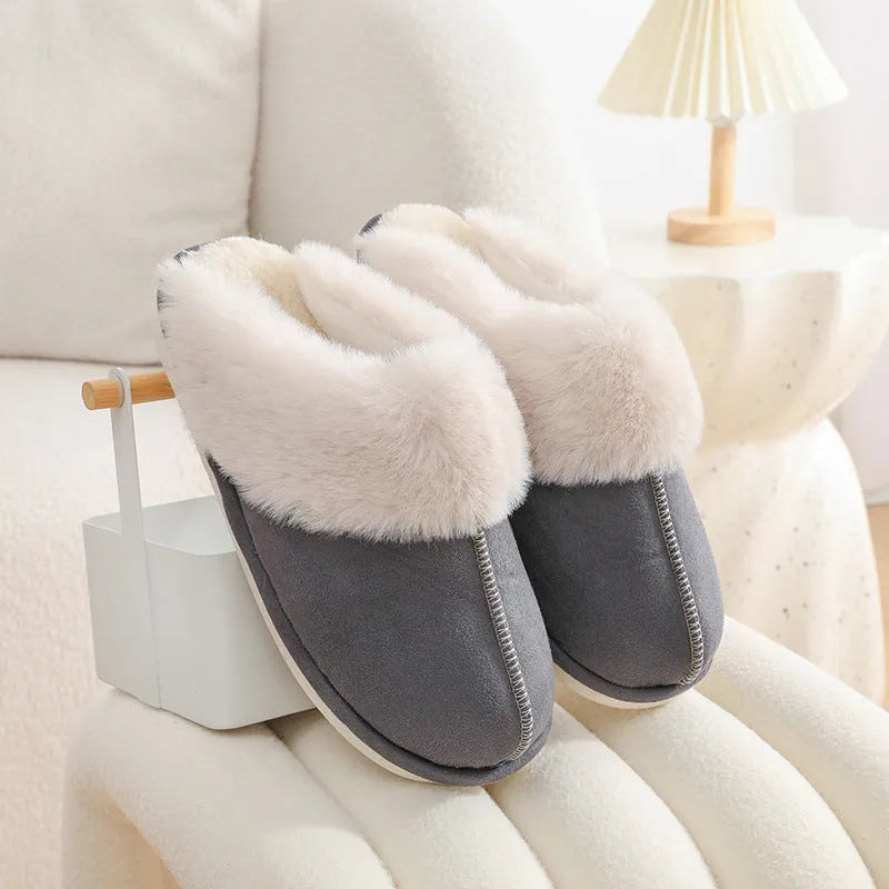 Women's brown plush indoor slippers with round toe, flat heel, and anti-slip PVC sole.