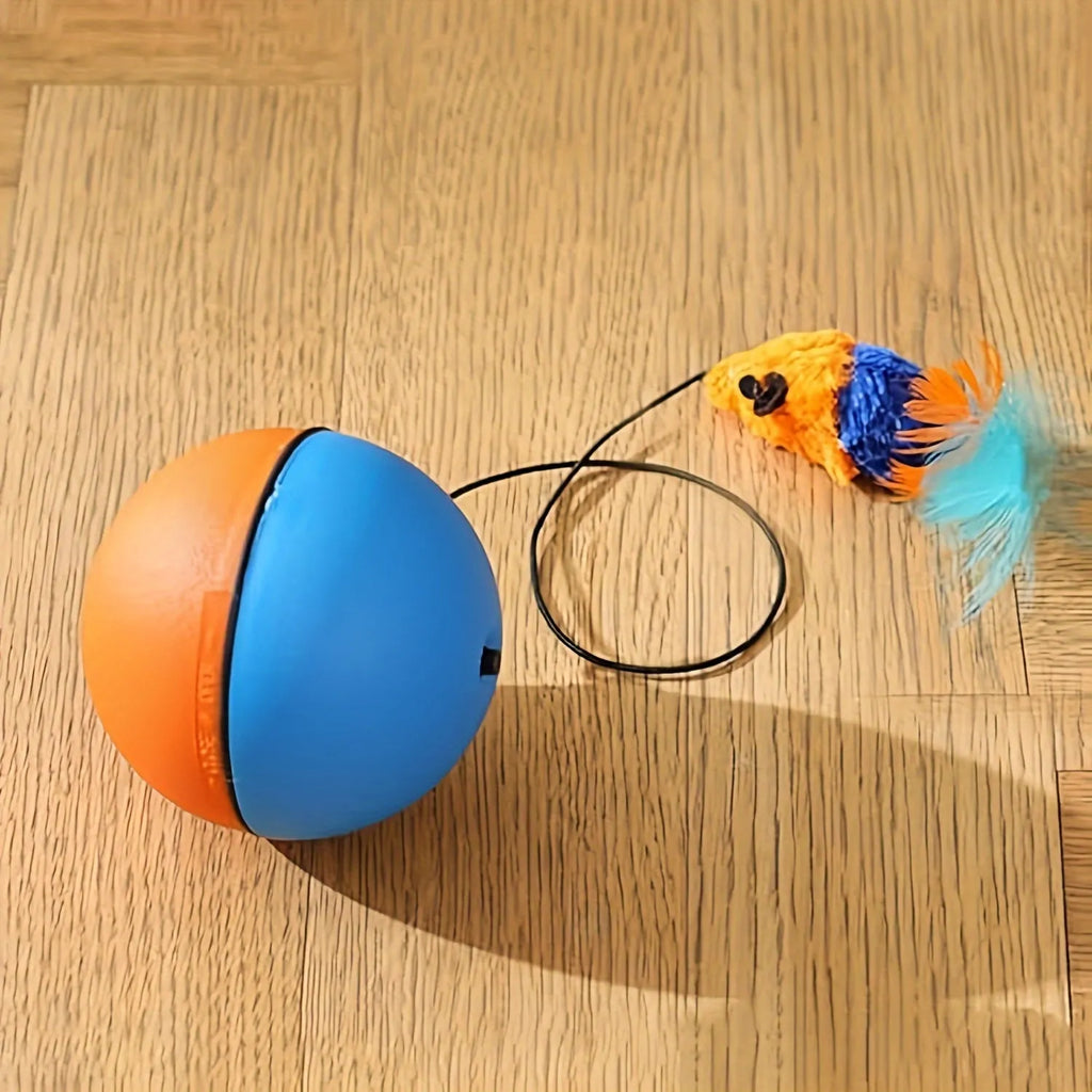 Interactive cat toy with orange rotating ball on grey plush mouse base, showing 8.5cm diameter