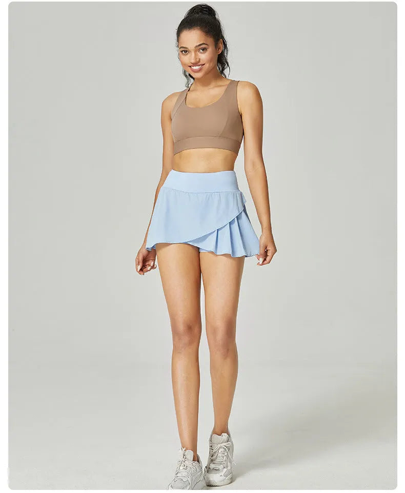 Women's solid colour quick-drying nylon sports shorts with spandex lining for summer fitness.