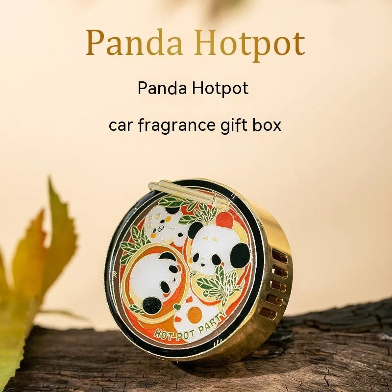 Panda hot pot shaped car air freshener diffuser mounted on a car vent with diatomaceous earth fragrance tablets