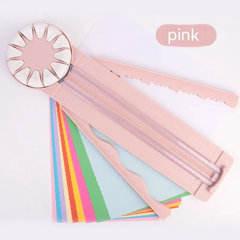 Pink and black 12-in-1 paper cutter with dotted plastic surface measuring 46.2cm