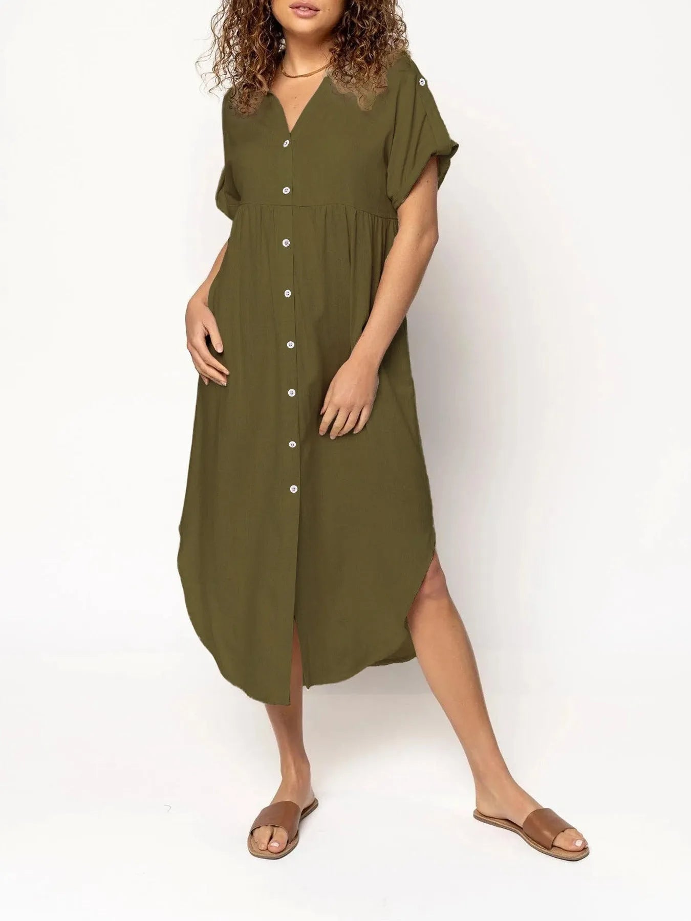 Loose-fit mid-length dress with button front in polyester fabric, available in multiple colours and sizes.