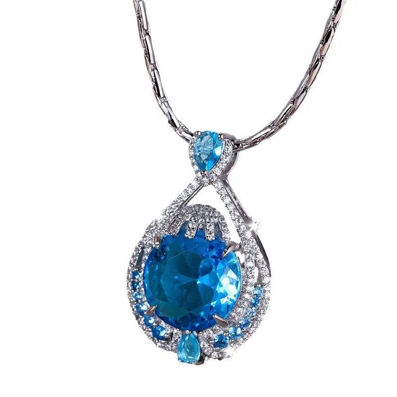 Women's geometric pendant necklace with bright blue fireworks-cut crystal and electroplated water wave chain