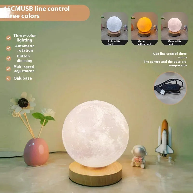 Rotating sleeping moon night lamp on a wooden base, showing three-colour light options.