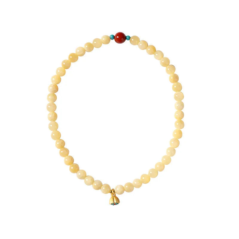 Hand-woven yellow topaz double ring bracelet with lotus seedpod beads for women.