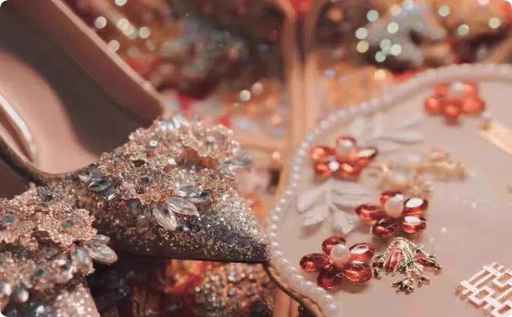 Champagne Xiuhe wedding shoes with rhinestone flower pattern and pointed toe on a fine heel.