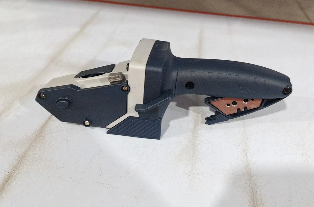 Blue aluminium woodworking cutter with one-press lock button and integrated tape measure for precise cutting