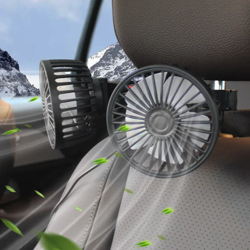 Black car USB fan with adjustable neck mounted on vehicle headrest showing 15cm diameter