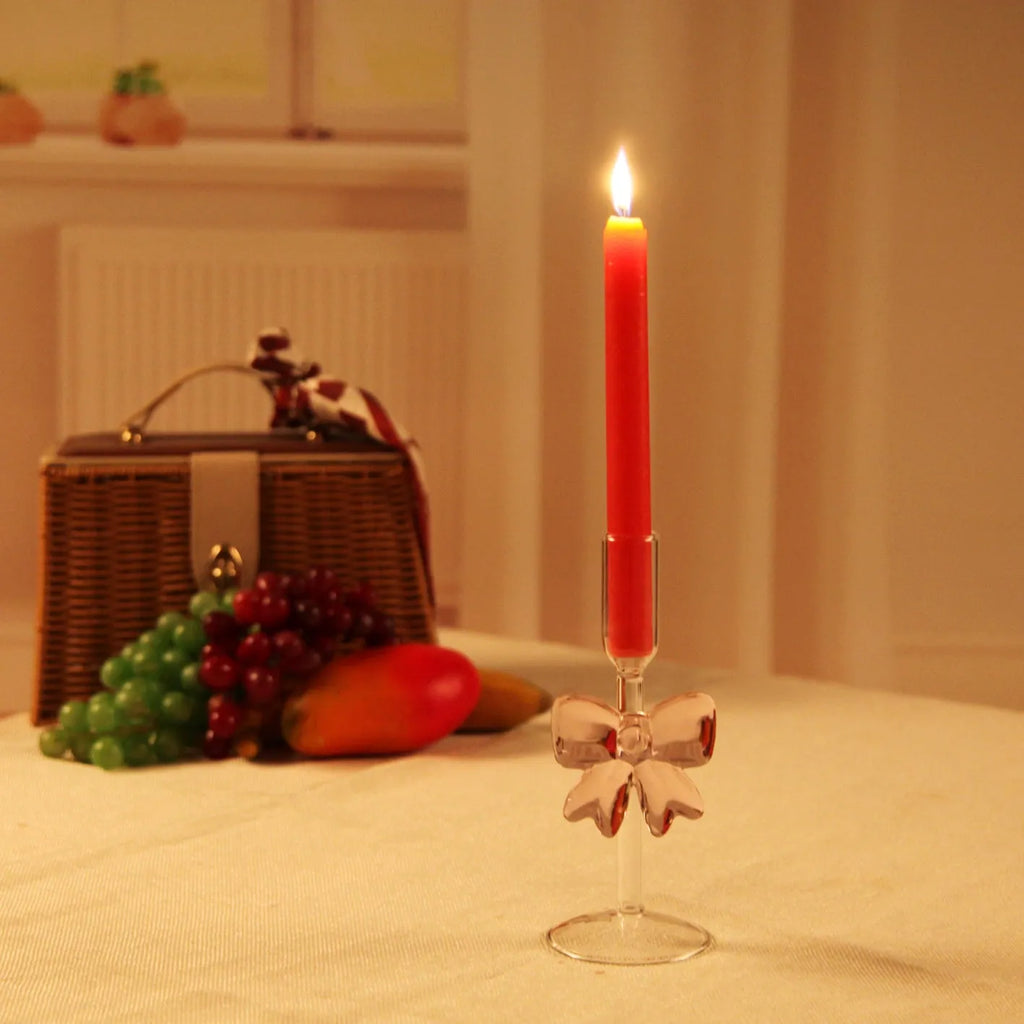 Handmade borosilicate glass bow candlestick holder with 2cm inner diameter and 7cm base, available in three heights