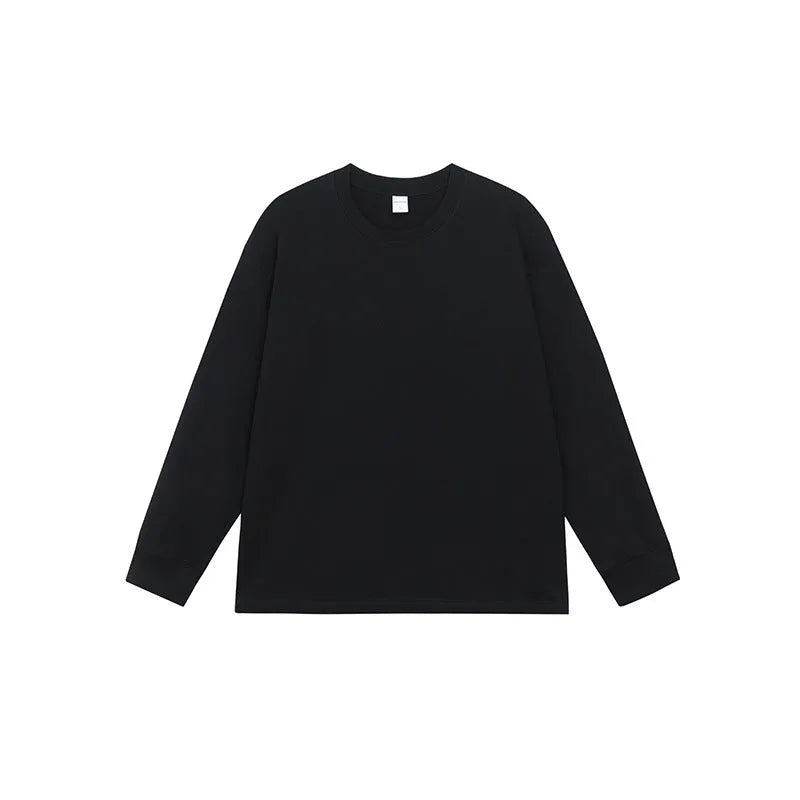 Men's simple solid colour long sleeve cotton t-shirt shown in loose fit on a hanger.