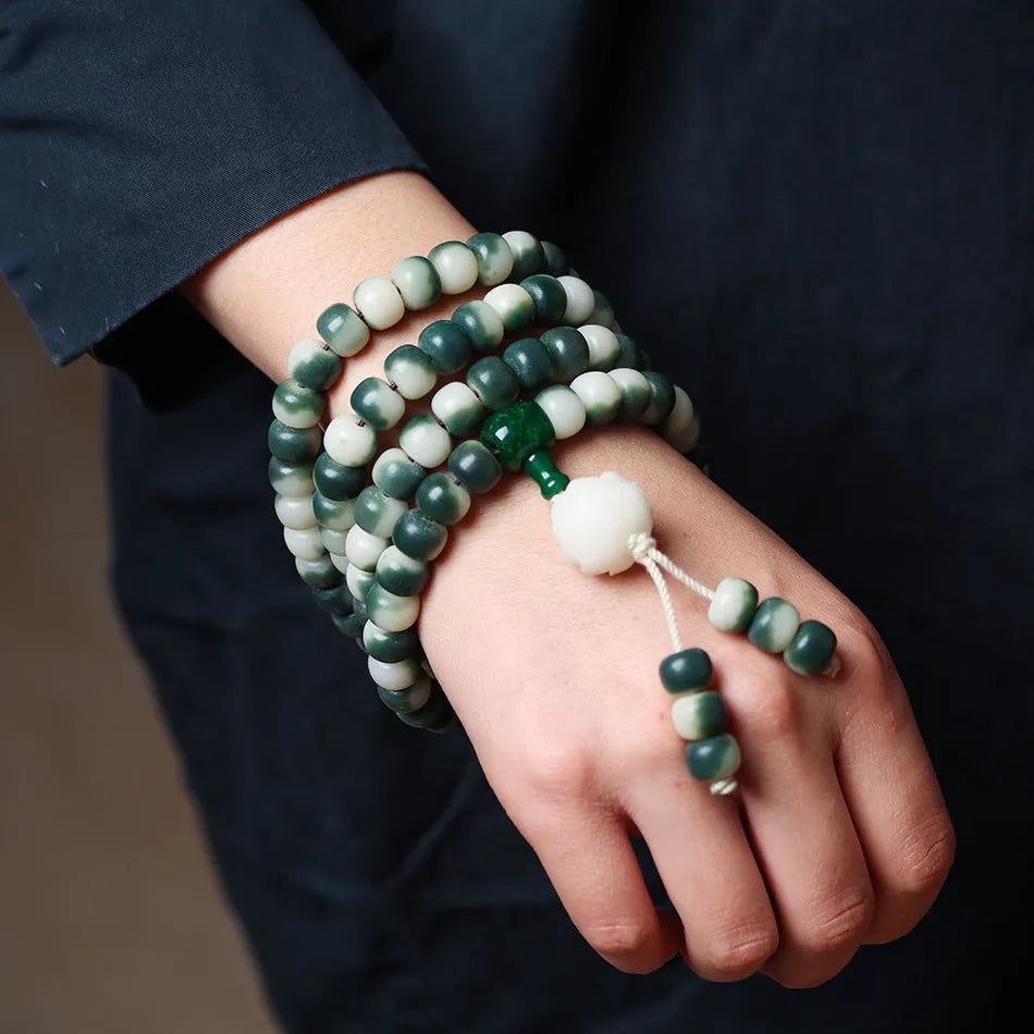 Lotus white jade bodhi beads bracelet with carved floral patterns on 8mm jade beads