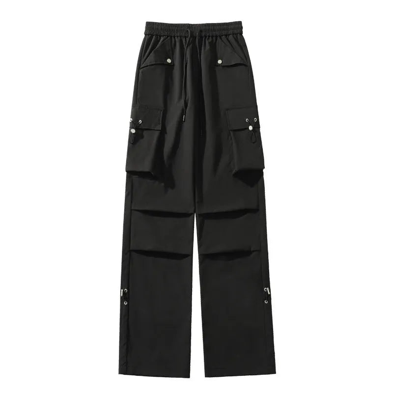 Waterproof loose-fit straight-leg trousers in black, available in plus sizes.