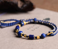 Hand-woven DIY watch band bracelet made from flexible wire in an ethnic lapis lazuli style.