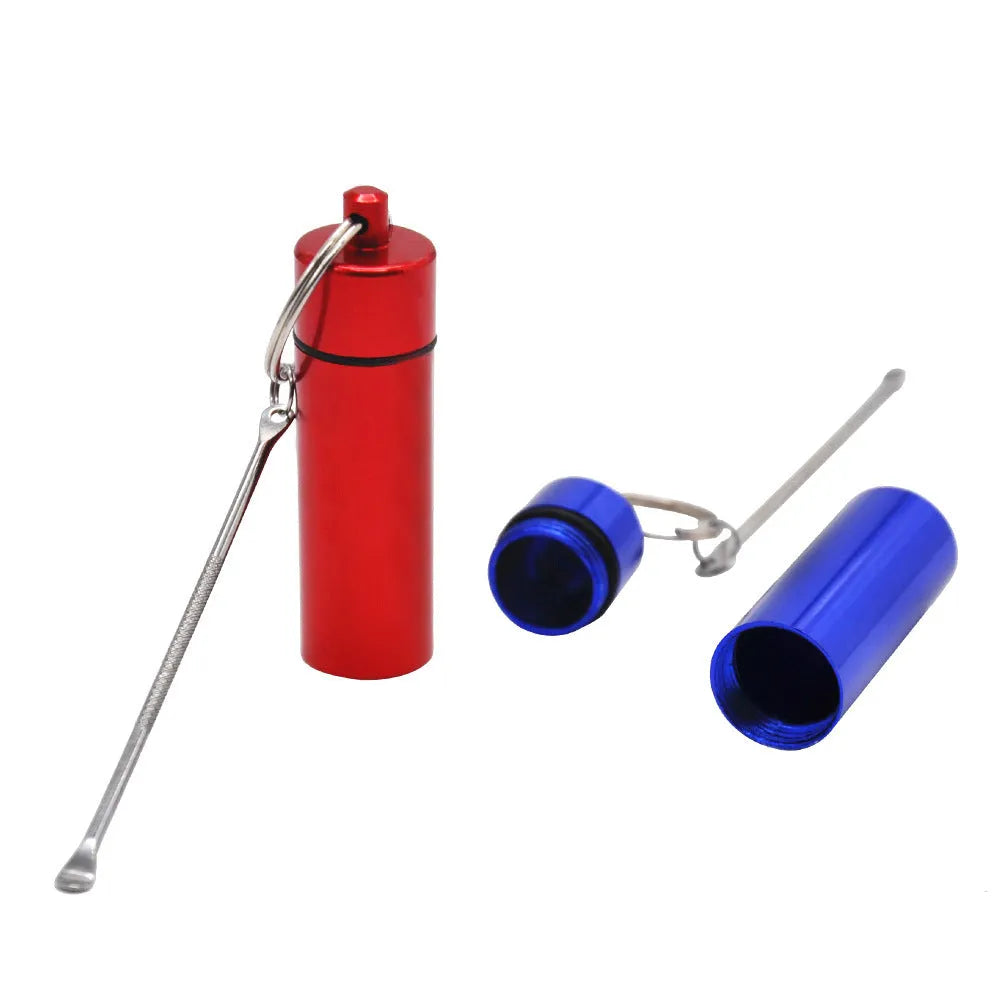 Blue aluminium portable pill box with attached spoon and keychain.