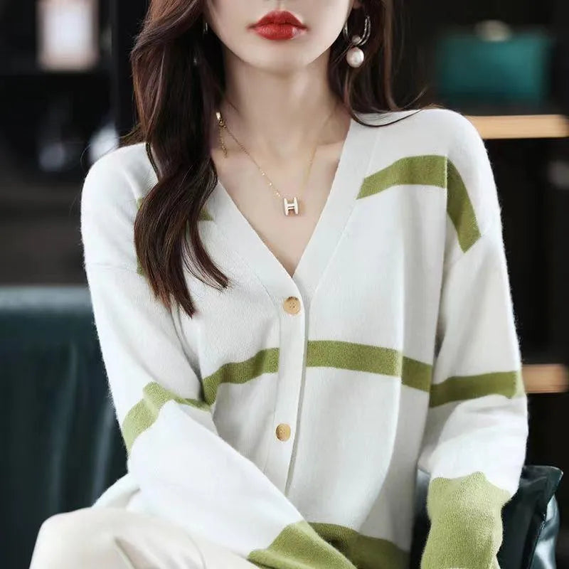 Women's V-neck cardigan with 3D striped pattern in slim fit, available in black/white, green, camel, and black apricot colours