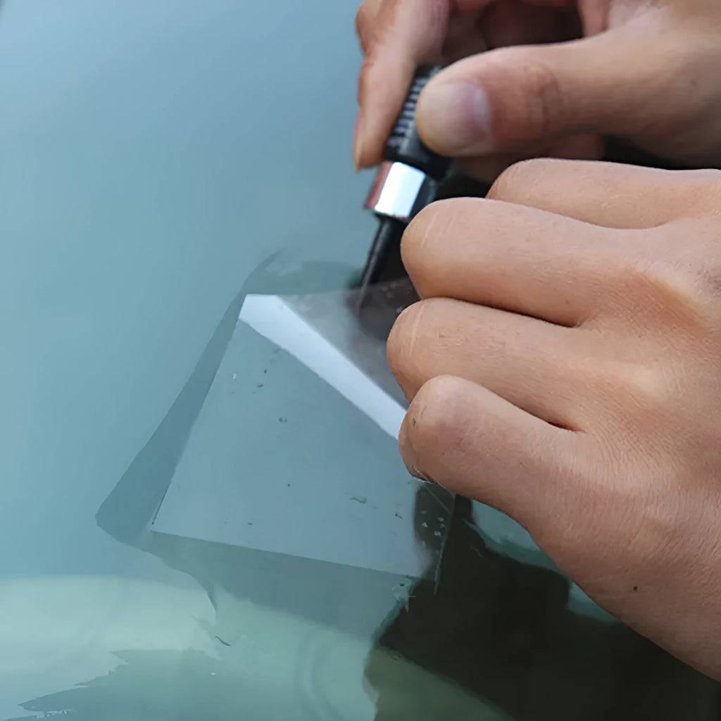 Yellow three-piece car windshield repair kit with glass repairing liquid