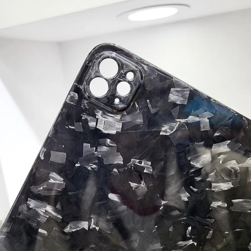 Carbon fibre flat protective cover for iPad Pro 11 showing embossed plaid pattern and precise port cutouts
