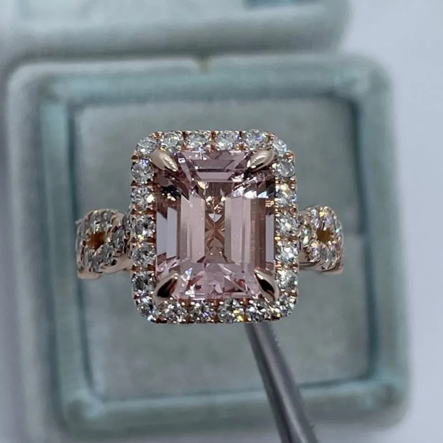 Rose gold electroplated alloy ring with geometric shape design showing angular lines and metallic finish