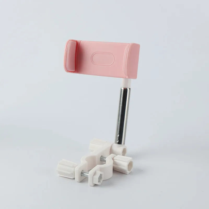 Black car phone holder mounted on rearview mirror with mobile phone secured in adjustable bracket