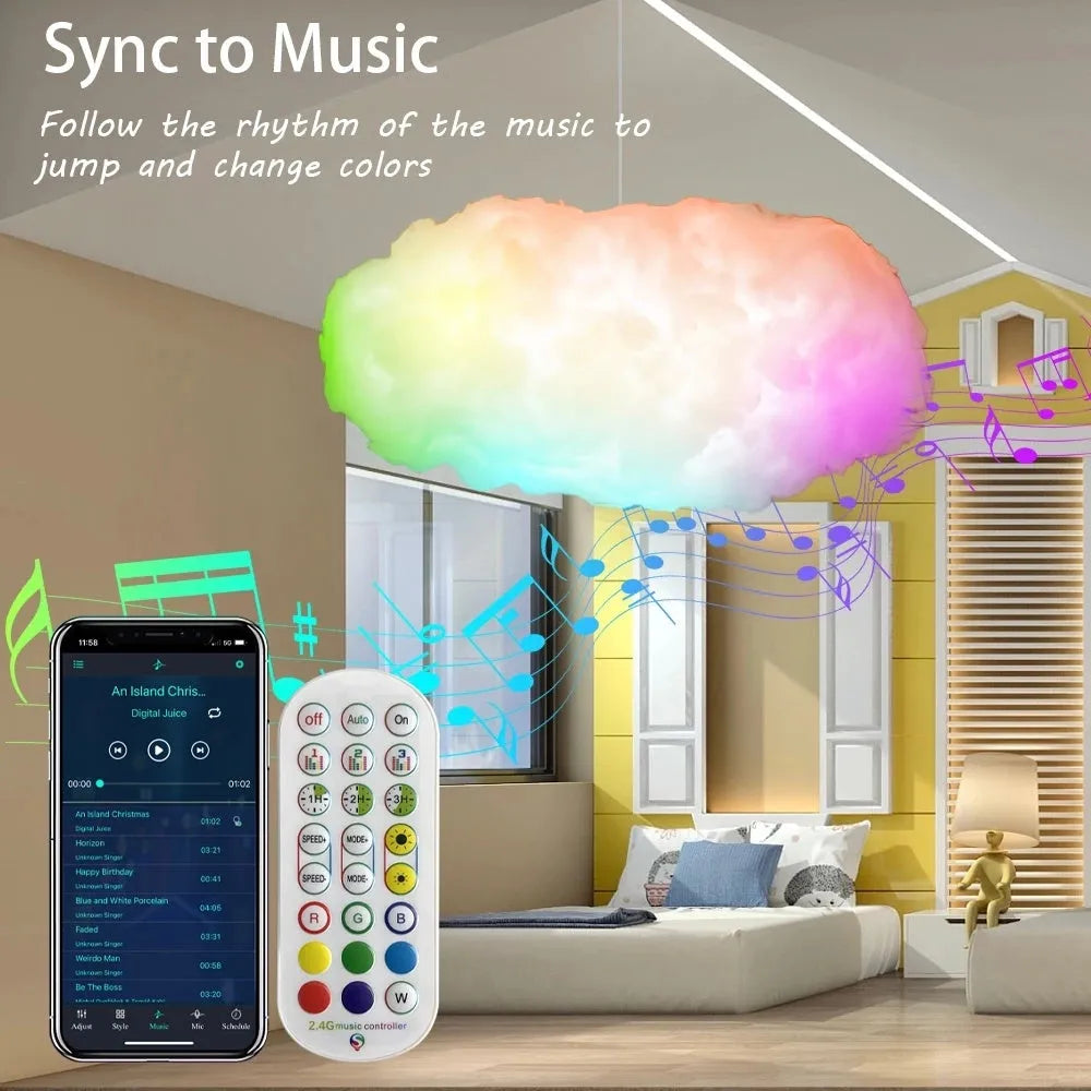 White fabric cloud shaped pendant light with multi-colour LED glow, hanging from a ceiling with a USB cable.