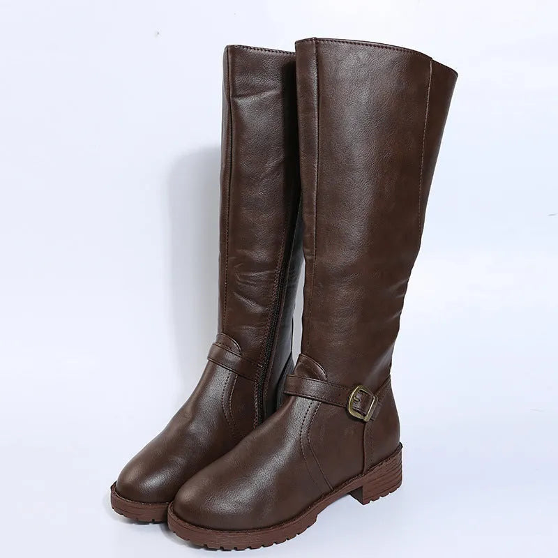 Women's black knight high boots with a square heel and a front belt buckle detail on a round toe.