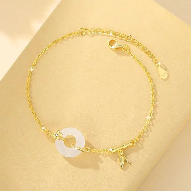 Silver-gold women's bracelet with peace buckle design, white chalcedony stone and starry sky decorations