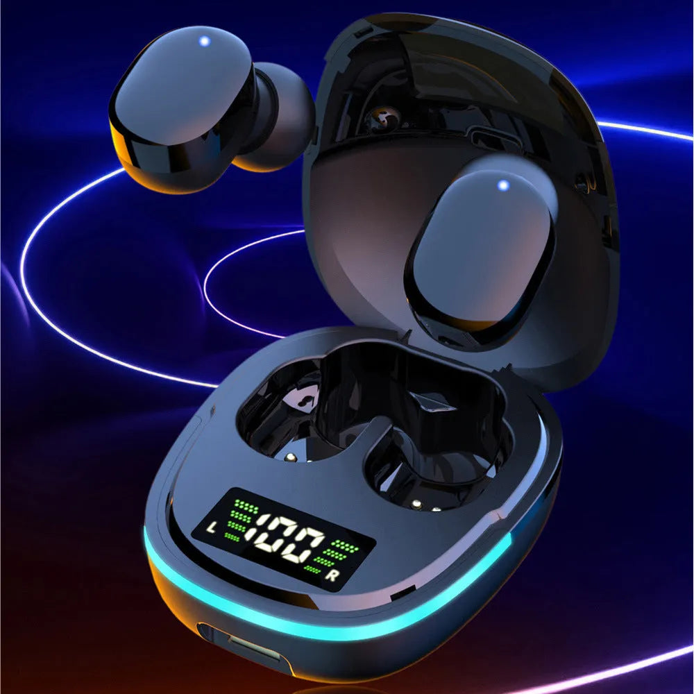 Black true wireless Bluetooth headphones with charging box showing digital battery display and three pairs of different sized ear caps