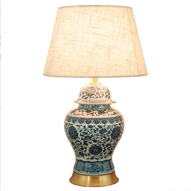 Chinese blue and white porcelain table lamp with handmade ceramic base and cloth shade