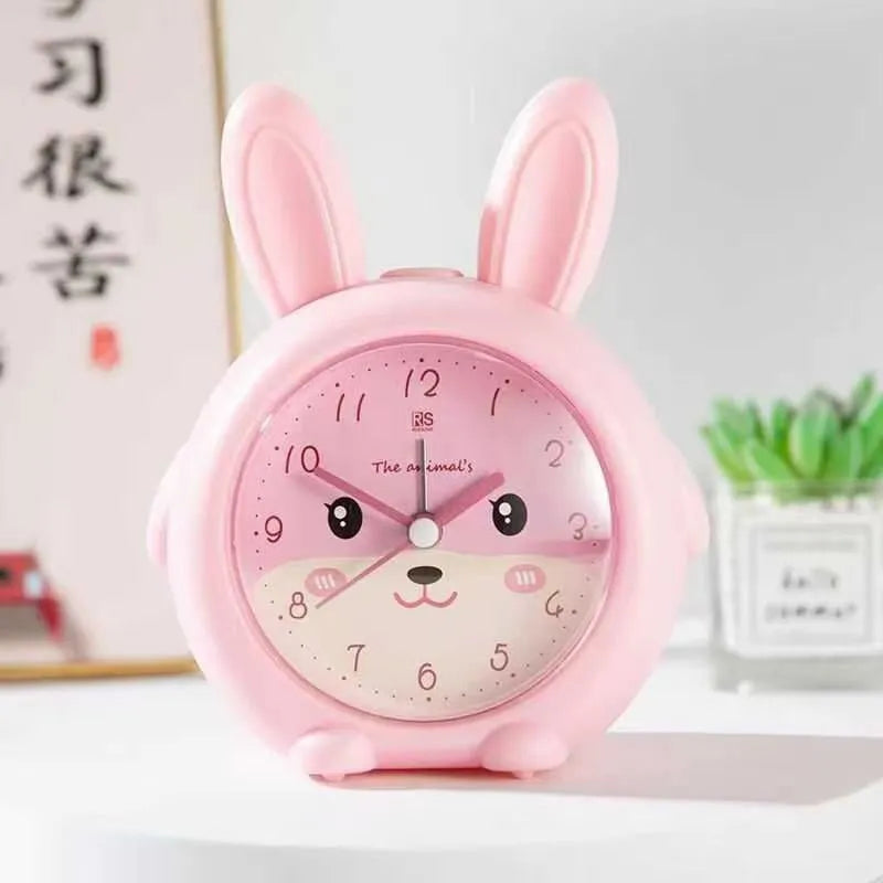 Children's cartoon alarm clock with 6.5cm thickness in 8108 pink colour showing mute, night light, and alarm functions