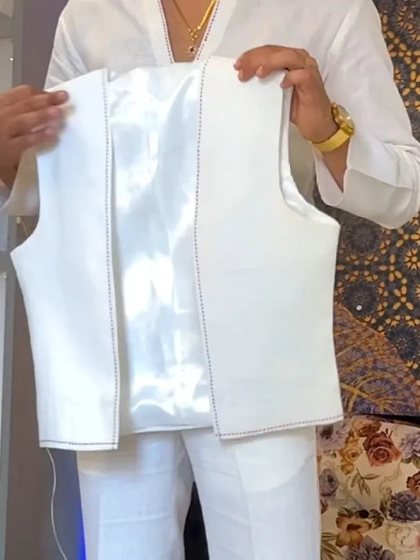 White polyester three-piece outfit with V-neck shirt, sleeveless vest, and regular-fit trousers.