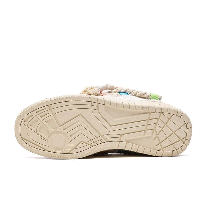 Creamy white retro skateboard shoes with low-top design, platform heel, and mesh lining details
