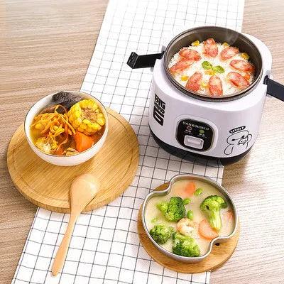 Blue 2-litre rice cooker with non-stick liner and steam pan on a kitchen counter