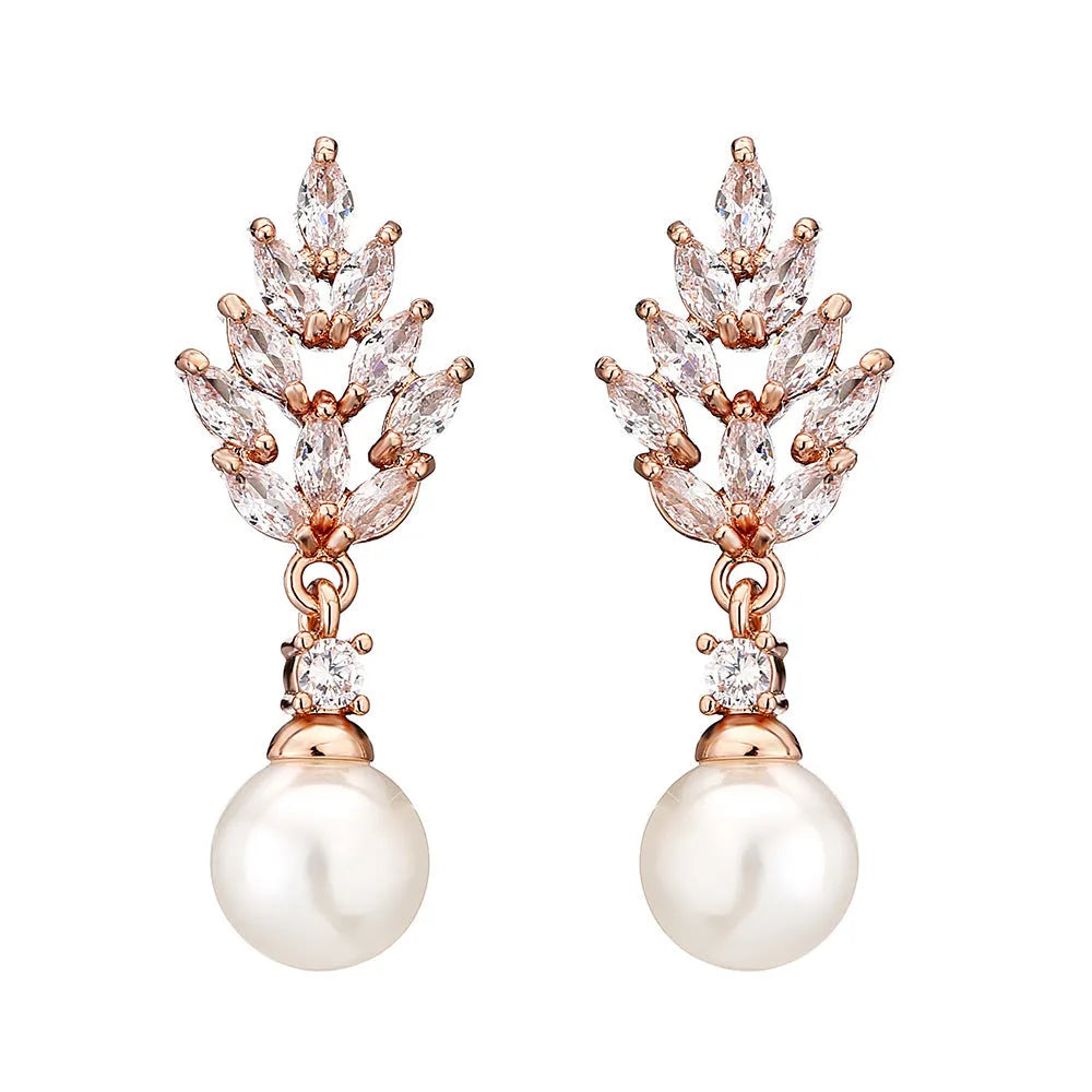 Geometric flower earrings with micro inlaid zircon stones on copper base, plated in gold, platinum, or rose gold.