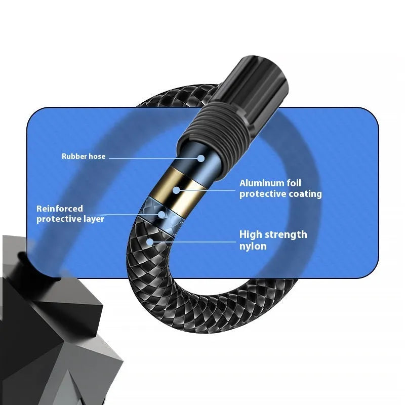 Black portable electric tyre inflator with digital display showing pressure reading, connected to car tyre valve