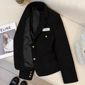 Women's black short suit coat with loose fit, long sleeves, and pocket details, shown in a commuting style.