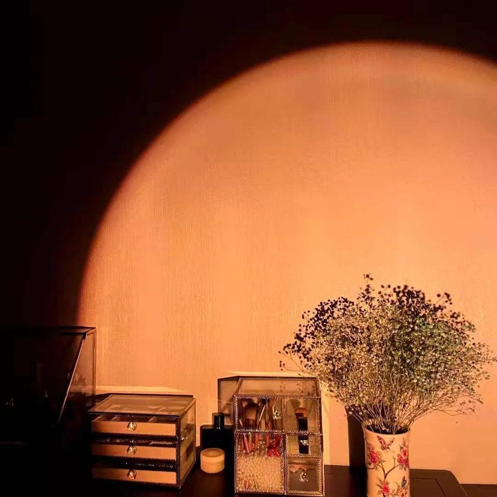 USB rechargeable rainbow projection lamp showing sunset red colour projection on wall