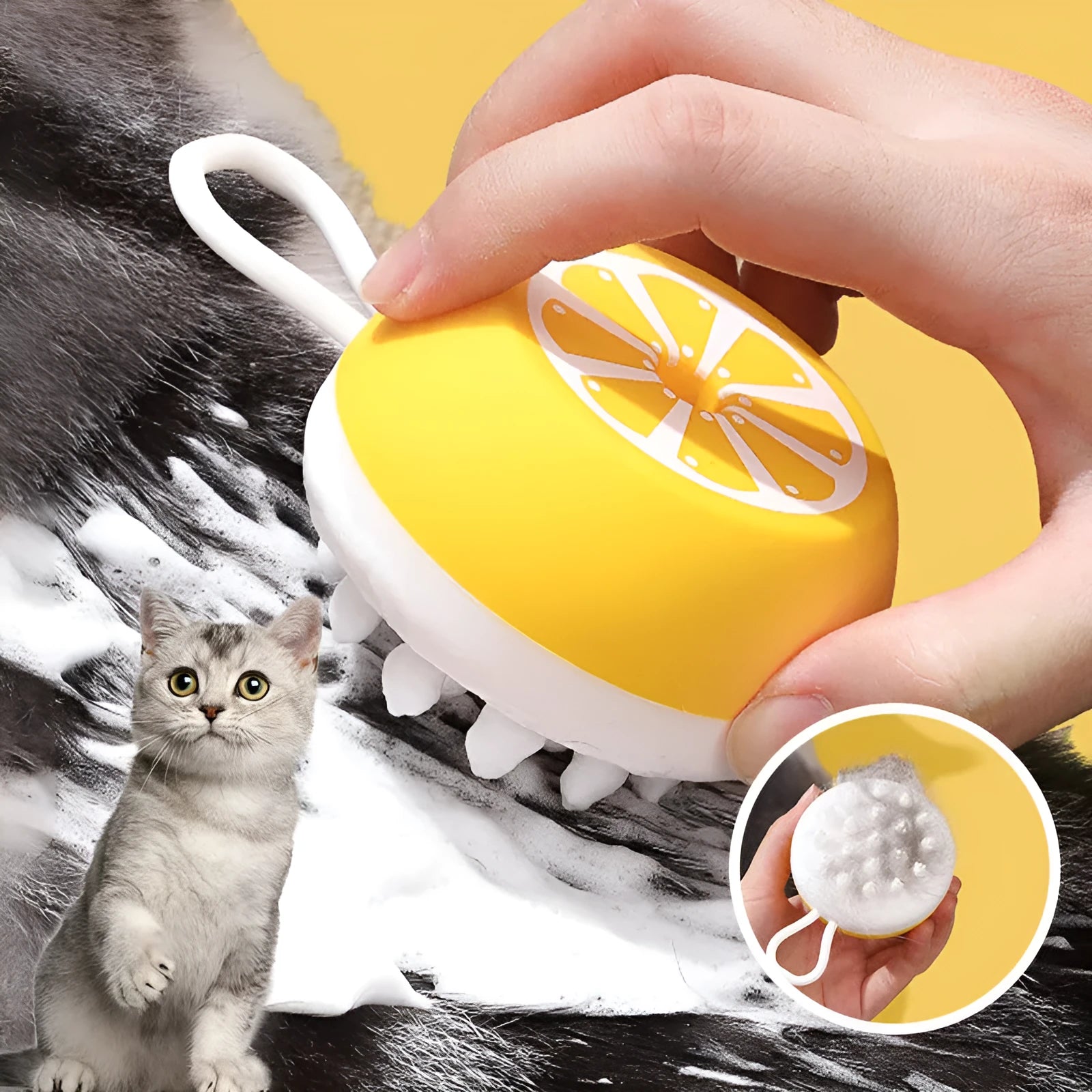 Yellow silicone pet bath brush with massage nodes and comb teeth on a white background.