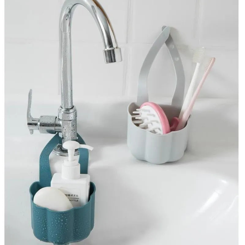 Nordic style dark blue plastic sink drain basket on a kitchen counter.