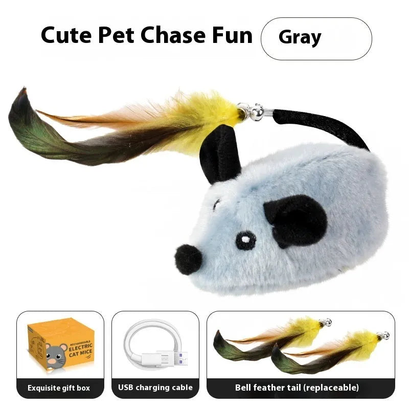 Grey charging mouse cat toy with double feather tail decoration on floor