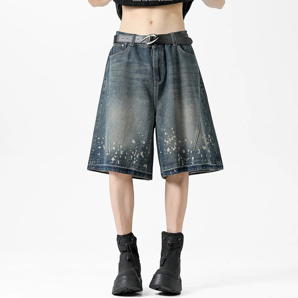 Men's retro washed blue denim shorts with five-point ripped splash ink design in straight cut
